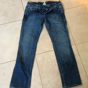 Women’s size 31 Vintage Rebel jeans.